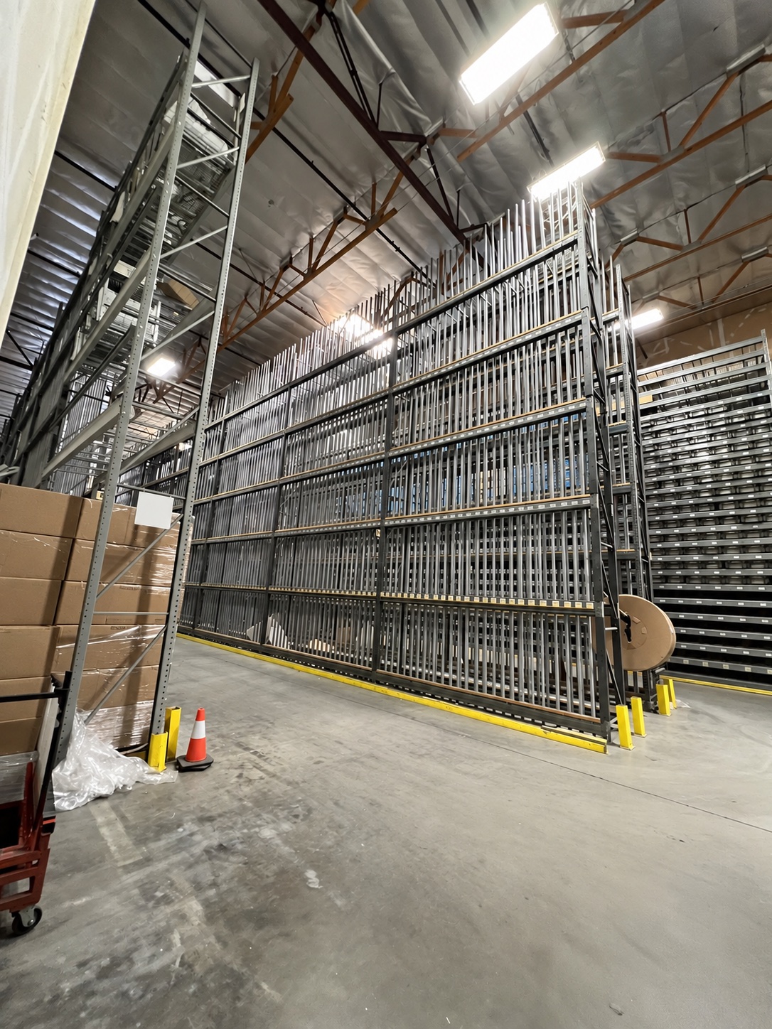 Tall warehouse storage installation viewed from the aisle